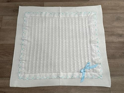 Soft Knitted Baby Blanket with Floral Accents